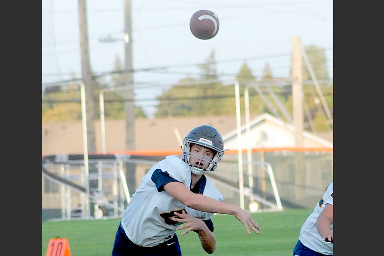 PREP FOOTBALL: Forks passing game flies past Port Angeles