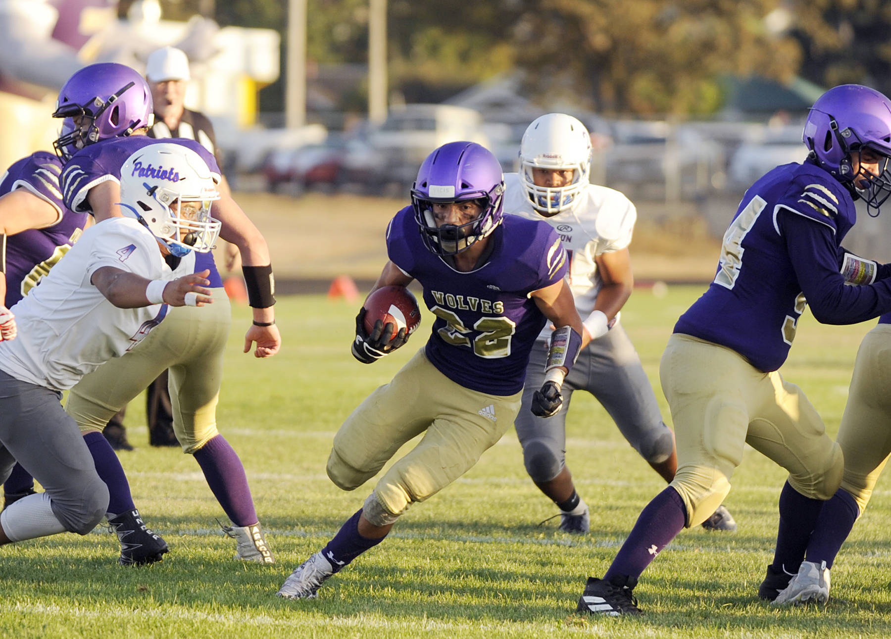 <strong>Michael Dashiell</strong>/Olympic Peninsula News Group                                Sequim running back Walker Ward crosses the goalline for a touchdown during the Wolves’ non-league game against Washington.