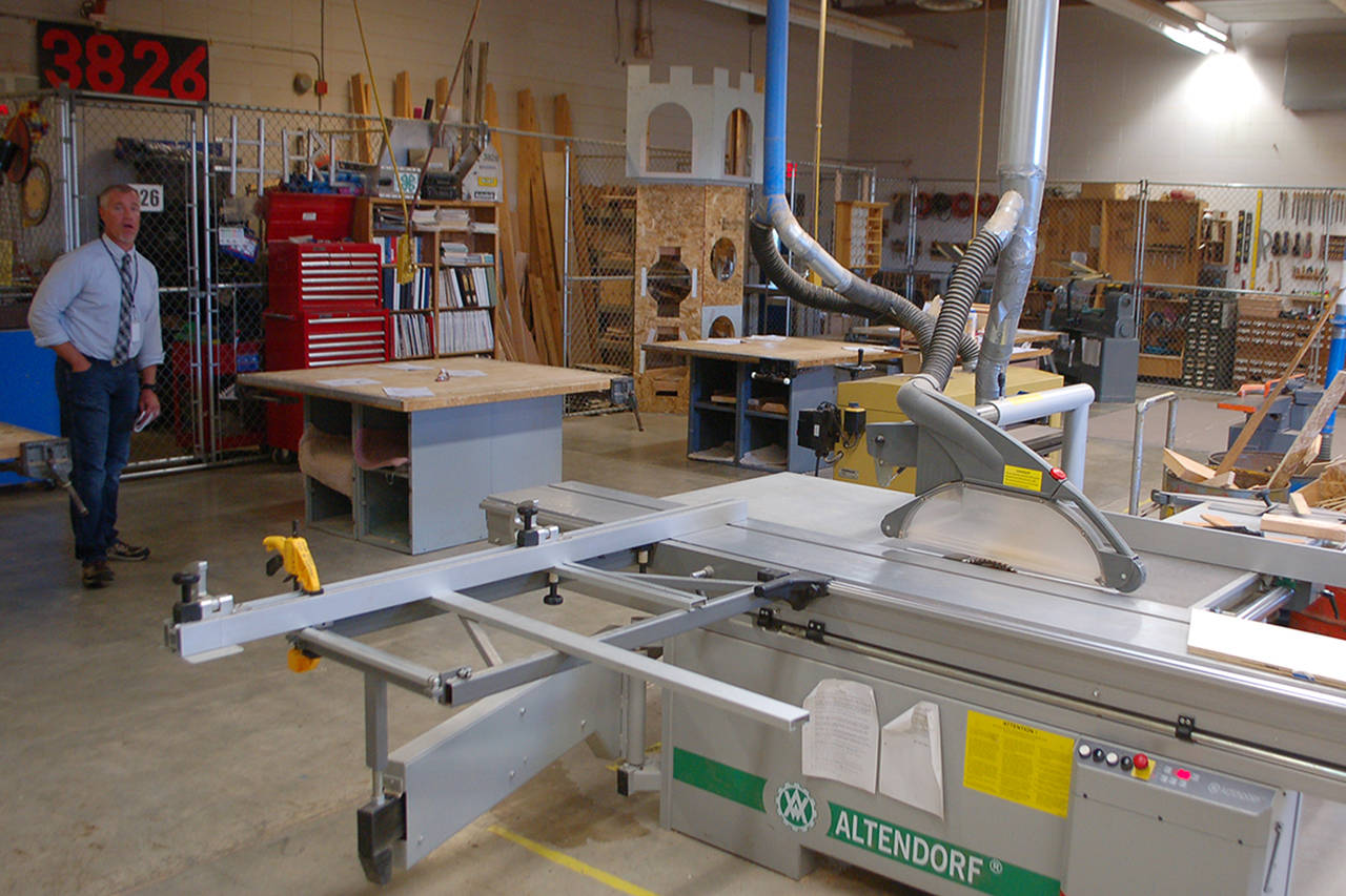 Steve Mahitka talks about the Sequim High School wood shop, which he says is getting a new fabrication machine “very soon” for students to learn how to use. “Letting them learn on machines like that can give them great tools for the future,” Mahitka said. Conor Dowley/Olympic Peninsula News Group