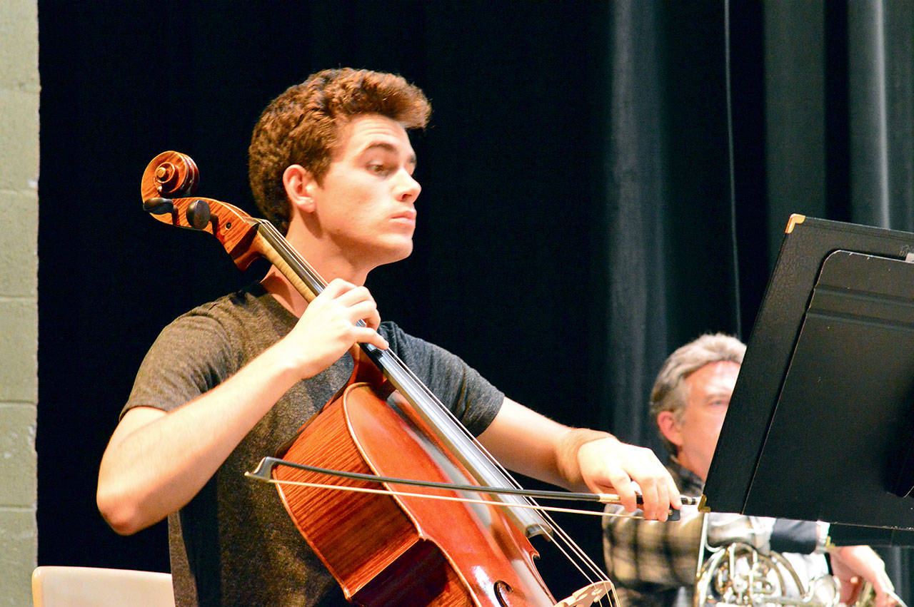 Port Angeles Symphony cellist Karson Nicpon, 17, shown here rehearsing, will be among the performers at Friday’s Concert & Cuisine. The fundraiser moves to The Cedars at Dungeness this year. (Diane Urbani de la Paz/for Peninsula Daily News)