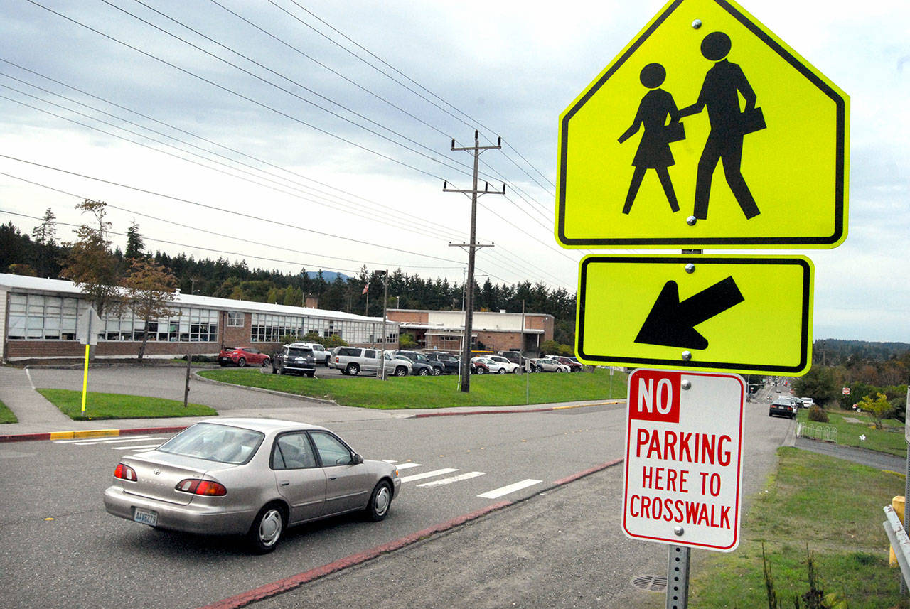 A car approaches a crosswalk across Lauridsen Boulevard in front of Franklin Elementary School in Port Angeles on Wednesday. (Keith Thorpe/Peninsula Daily News)