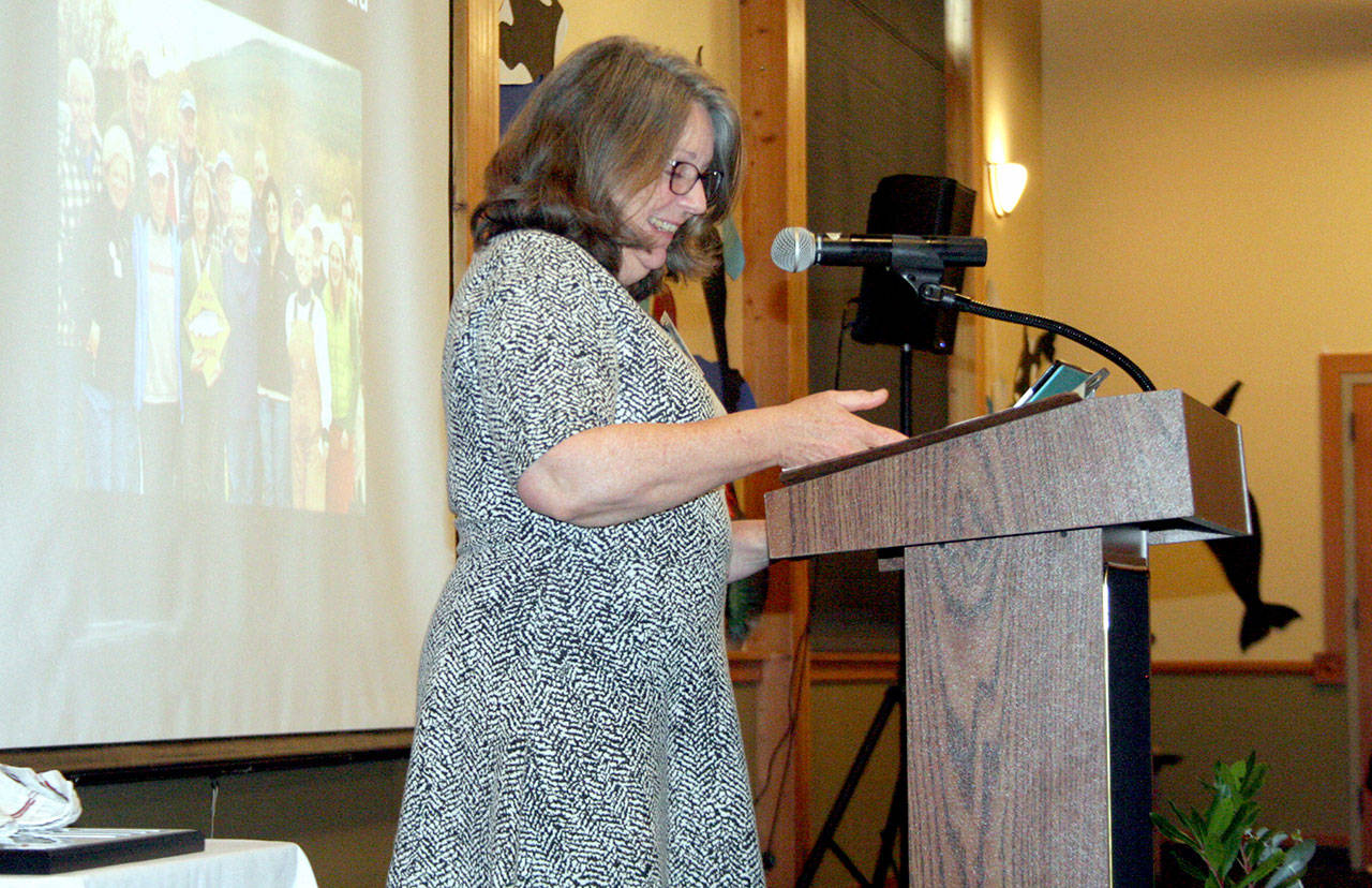 Cheri Scalf speaks Thursday morning in front of about 200 people at the Fort Worden Commons as she is honored with the 2019 Eleanor Stopps Environmental Leadership award. (Brian McLean/Peninsula Daily News)