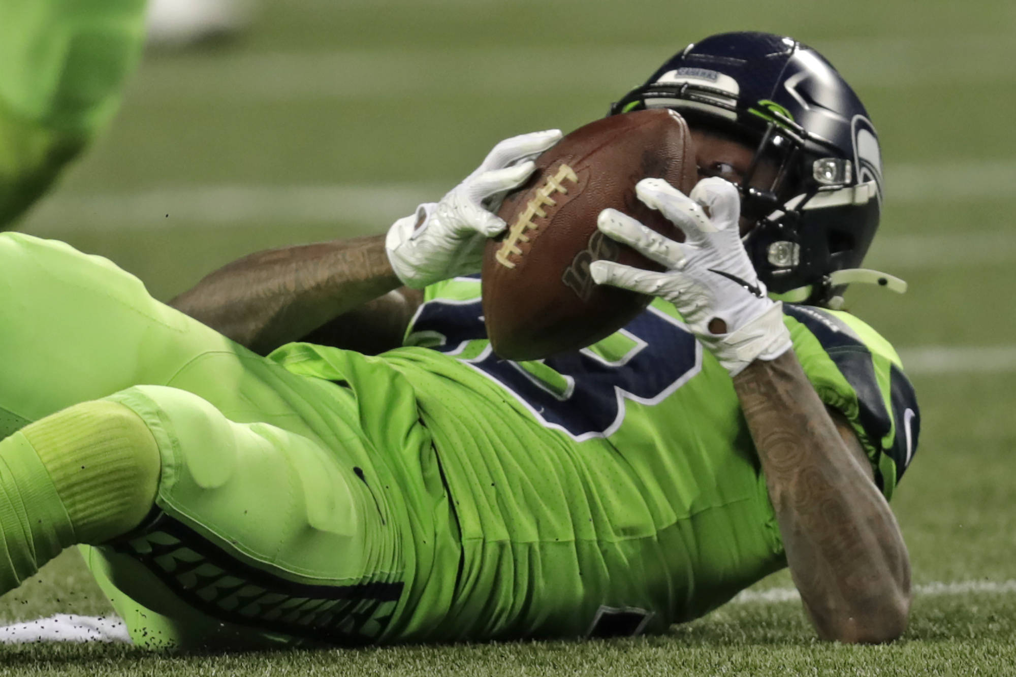 Seattle, United States. 3rd Oct, 2019. Seattle Seahawks running back Chris  Carson (32) catches the winning 5-yard touchdown pass against the Los  Angeles Rams at CenturyLink Field during the fourth quarter in