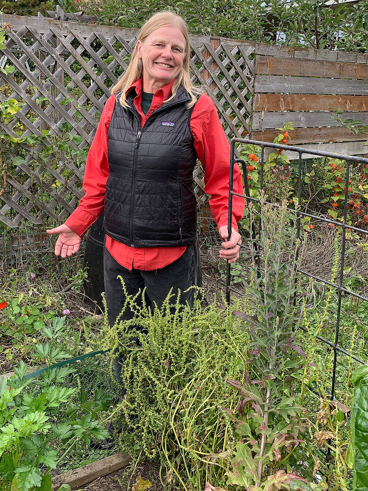 Selinda Barkhuis, pictured here in her vegetable garden where she uses intensive and organic practices to grow a wide variety of fruits, vegetables and herbs, is the featured speaker at the Green Thumb Gardening Tips Education Series on Thursday. (Betty Harriman)