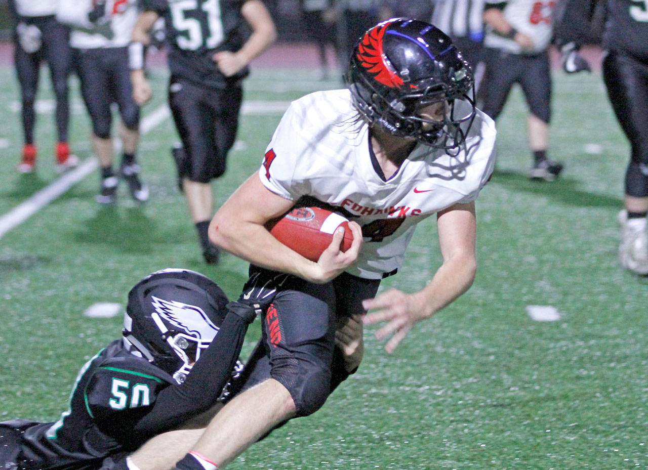 Lisa Jensen Pressed into service at fullback due to a rash of injuries, Port Townsend senior lineman Wes Blue scored a touchdown during the Redhawks’ 51-16 loss to Klahowya last Friday.