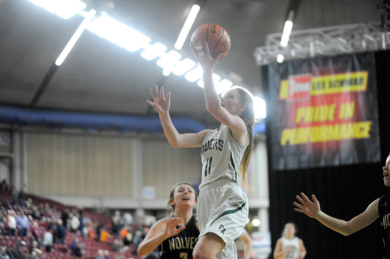 Port Angeles’ Millie Long rises for a layup during a state tournament win over Sequim last season. (Michael Dashiell/Olympic Peninsula News Group)