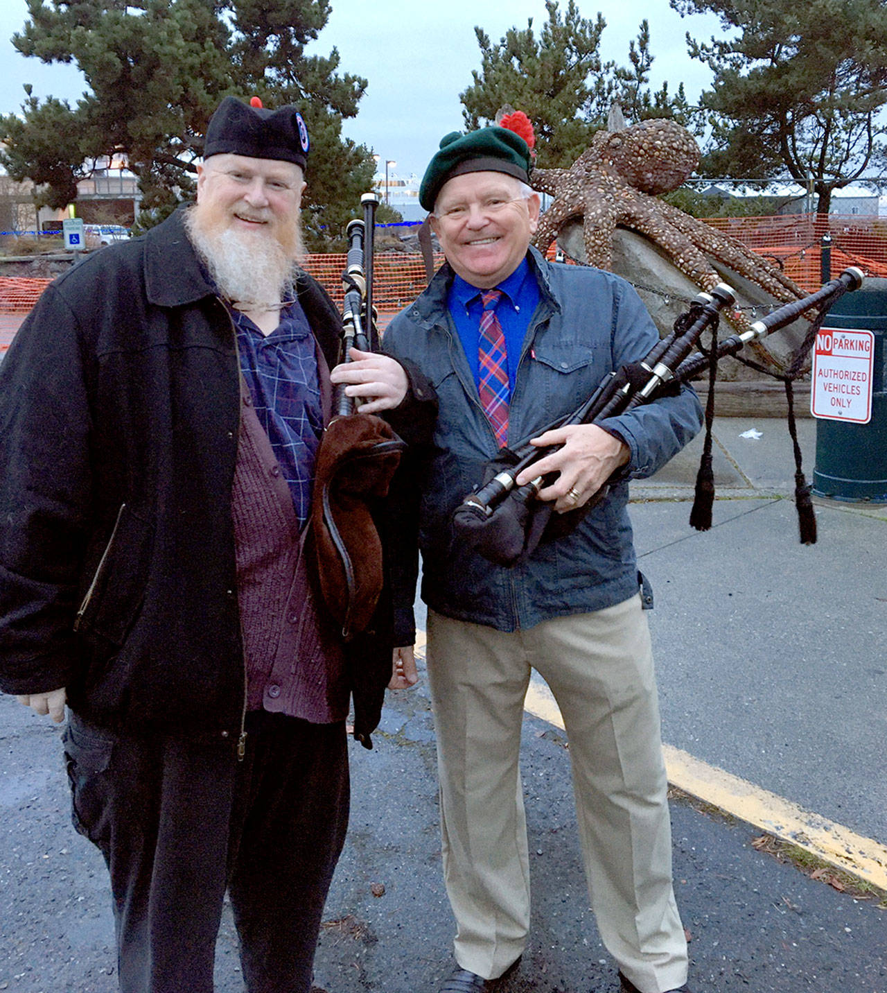 Eric Evans, left, and Dr. Tom McCurdy plan to celebrate Christmas by playing their bagpipes on City Pier.