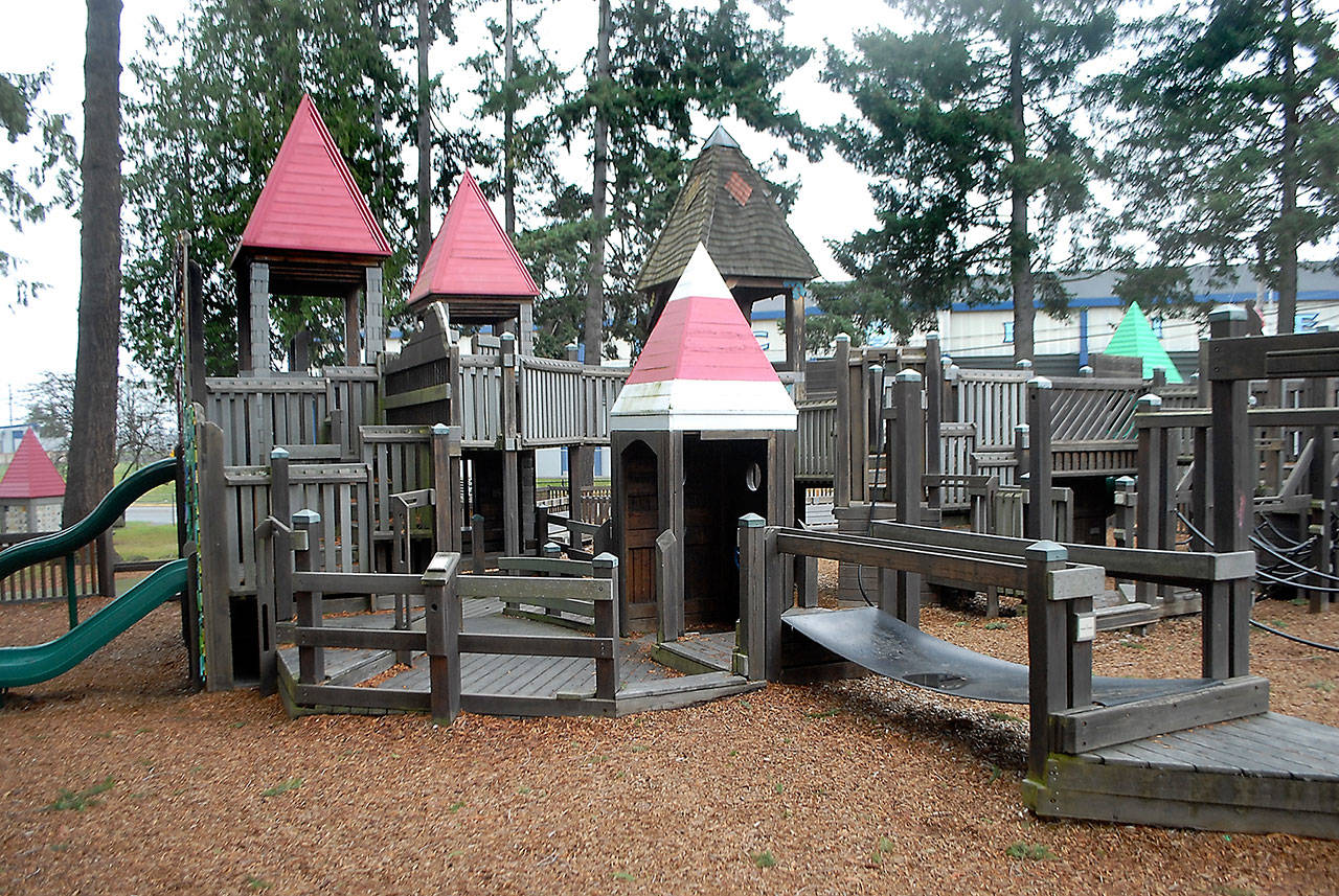 The wooden play structures of the Dream Playground at Erickson Playfield are destined for removal and replacement with safer and more durable playground equipment in a design determined partially by Port Angeles school children. (Keith Thorpe/Peninsula Daily News)