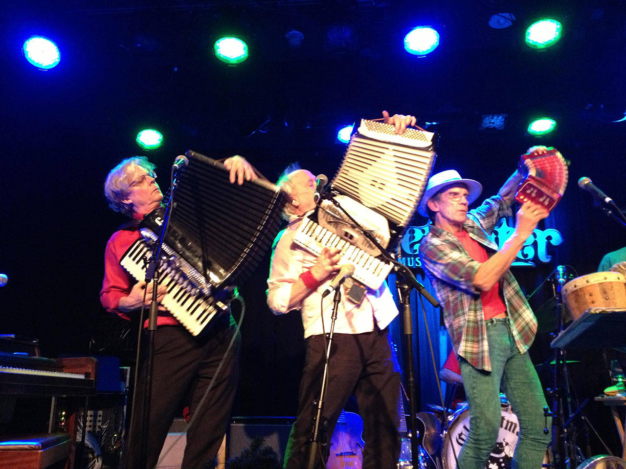 Christmas Jug Band members Paul Rogers, left, Austin de Lone and Tim Eschliman raise accordions and money in this weekend’s Holiday Hi-Jinx concerts. The shows in Chimacum and Port Townsend benefit the Jefferson County Winter Shelter. (Kathy Daniusis)