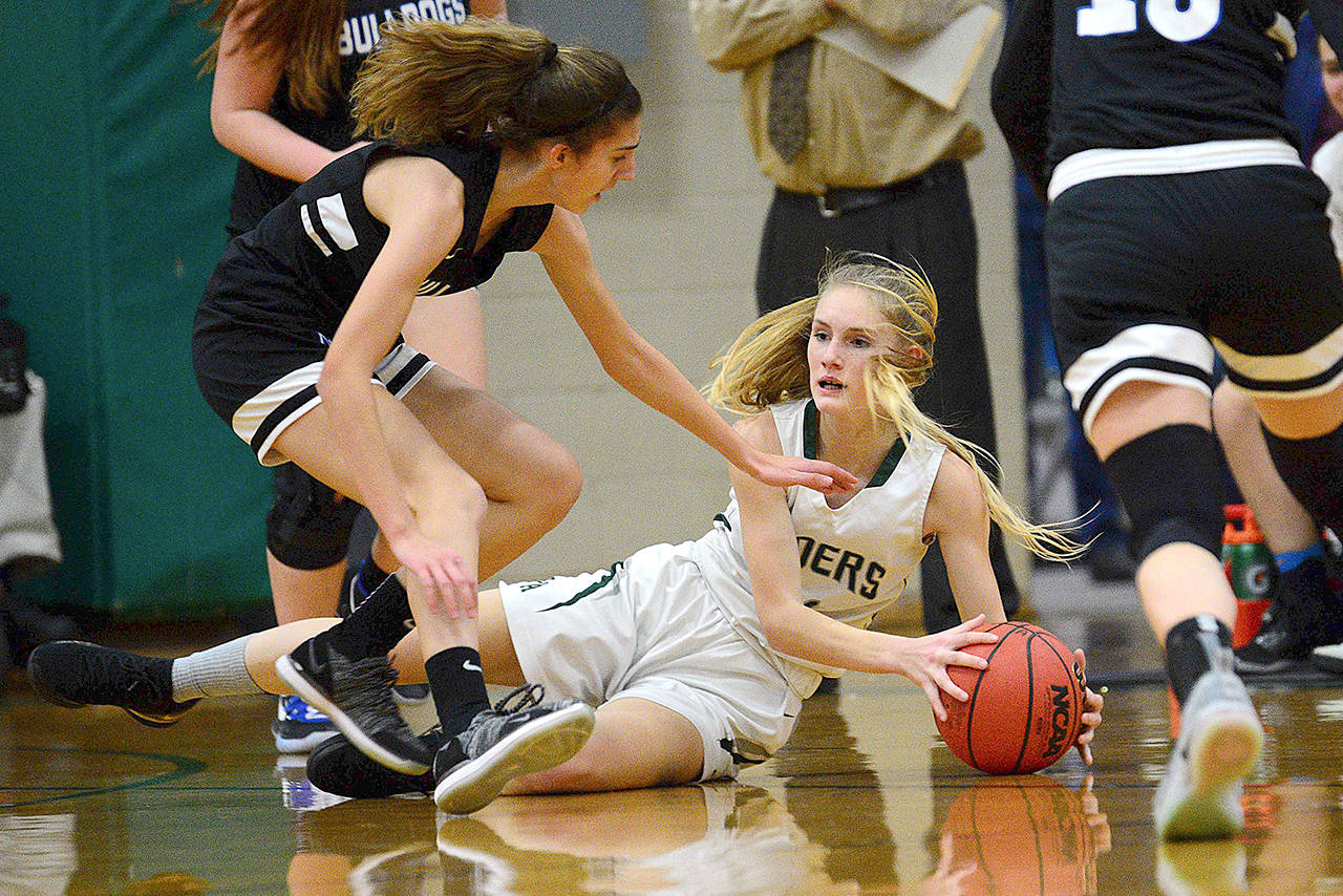 Port Angeles’ Millie Long scrambles for a loose ball in Friday’s game against North Mason.                                Jesse Major/for Peninsula Daily News