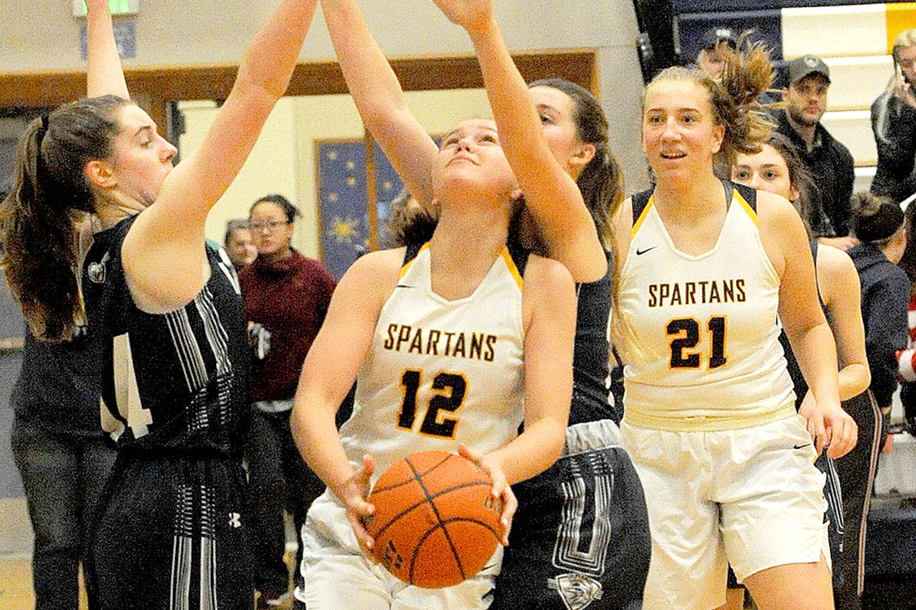 PREP ROUNDUP: Spartan girls and boys hang on for wins; Sequim girls lose their first