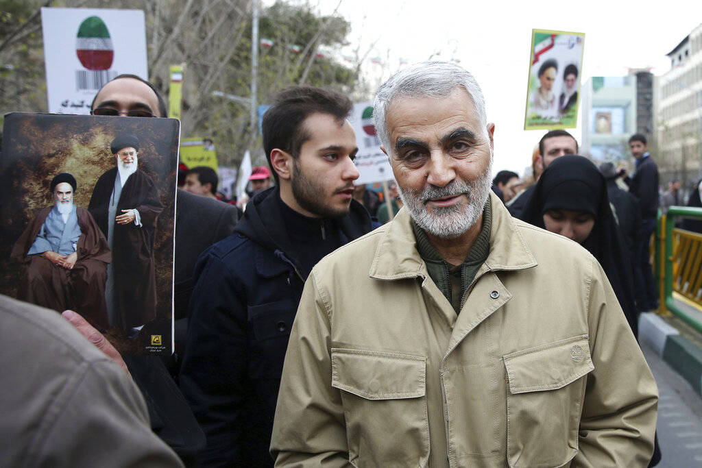 In this Thursday, Feb. 11, 2016, file photo, Qassem Soleimani, commander of Iran’s Quds Force, attends an annual rally commemorating the anniversary of the 1979 Islamic revolution in Tehran, Iran. Iraqi TV and three Iraqi officials said Friday, Jan. 3, 2020, that Gen. Qassem Soleimani, the head of Iran’s elite Quds Force, has been killed in an airstrike at Baghdad’s international airport. (AP Photo/Ebrahim Noroozi, File)