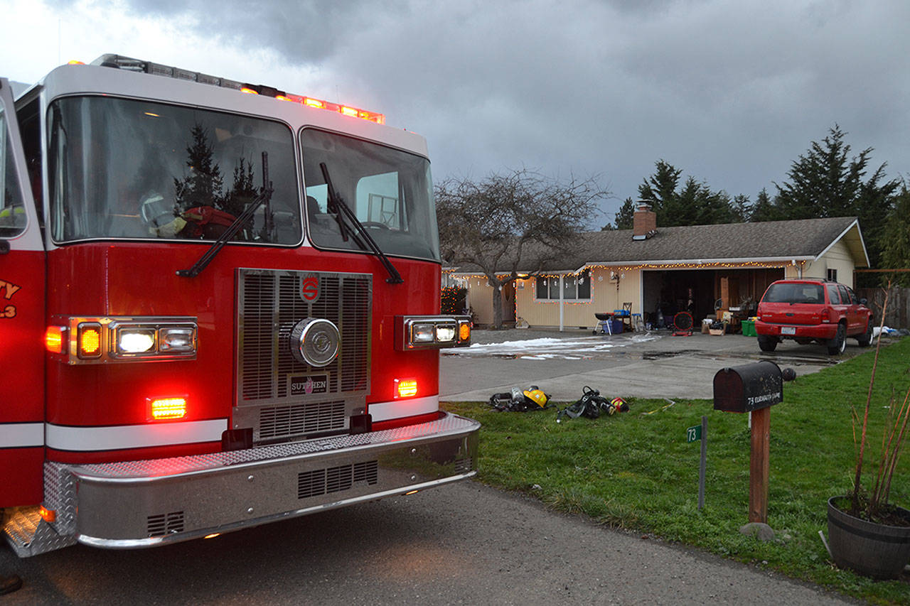 <strong>Matthew Nash/</strong>Olympic Peninsula News Group                                Clallam County Fire District 3 personnel extinguished a garage fire.