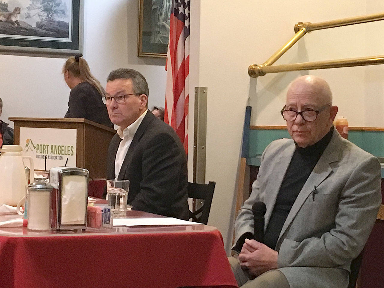 Port Angeles School District levy proponent Jim Haguewood, left, and opponent Dan Shotthafer field questions in a Port Angeles Business Association forum Tuesday at Joshua’s Restaurant. District voters will consider the five-year, $52.6 million levy in a special election Feb. 11. (Rob Ollikainen/Peninsula Daily News)