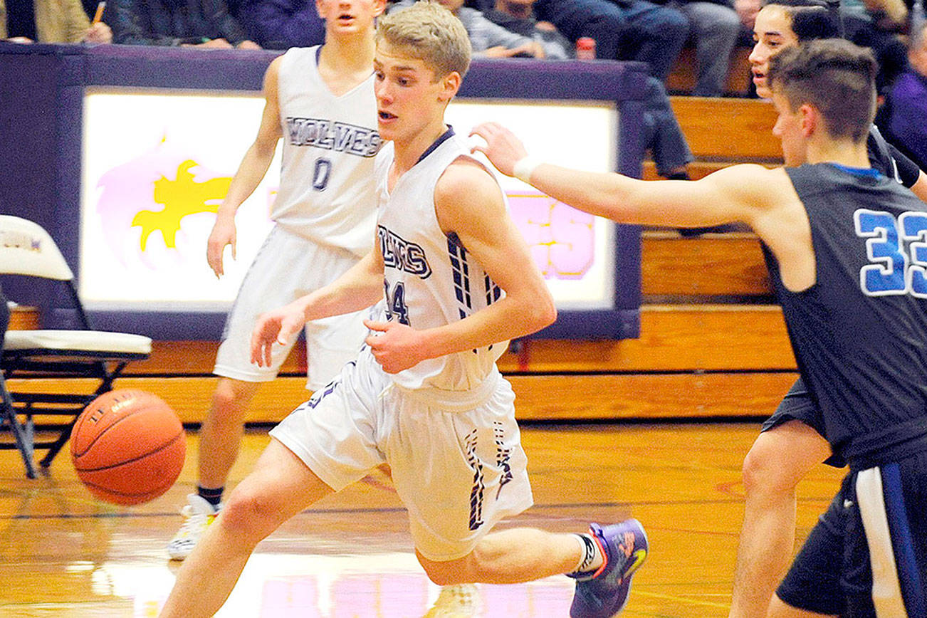 PREP BASKETBALL: Wolves hold off Olympic for league win