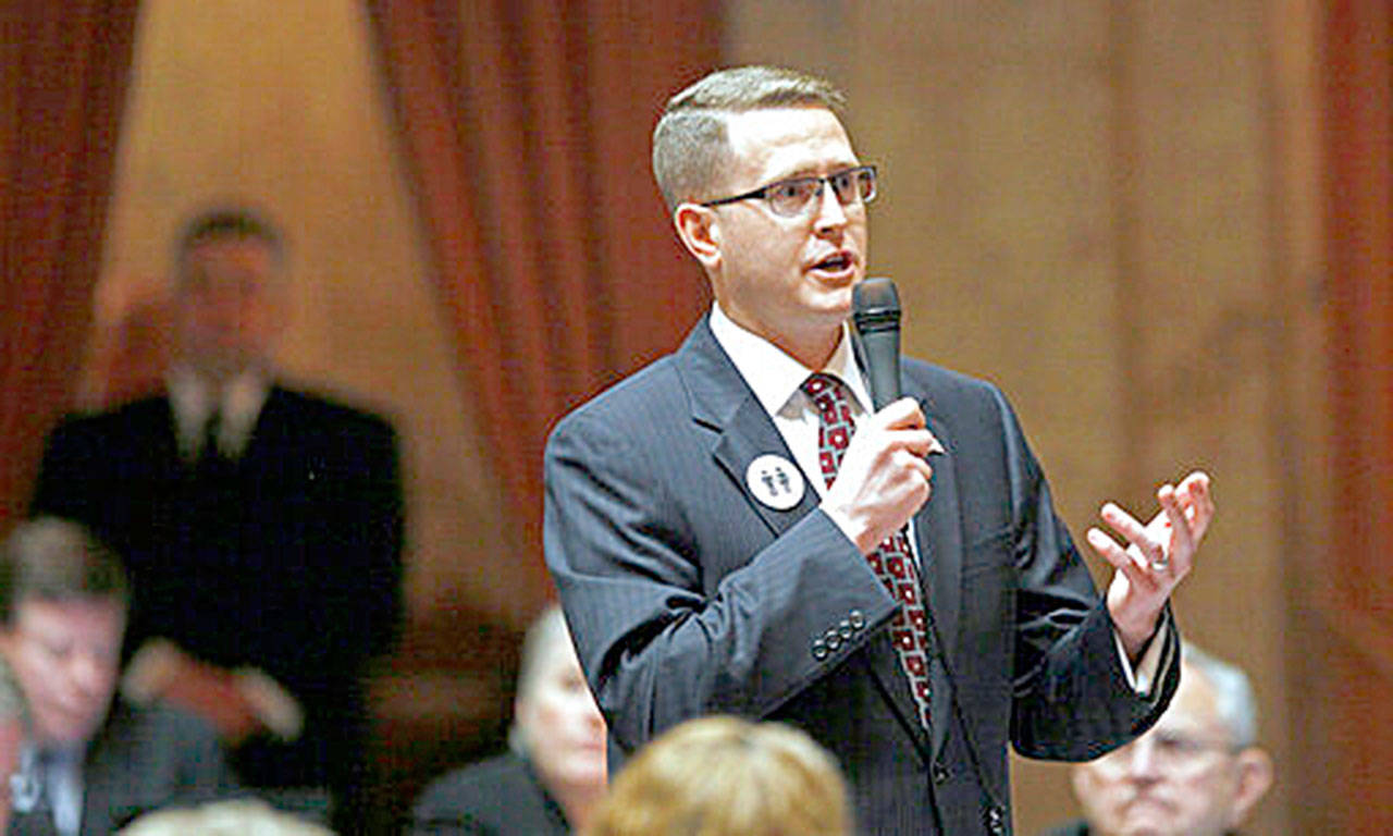 In this Feb. 8, 2012, file photo, state Rep. Matt Shea, R-Spokane Valley, speaks at the Capitol in Olympia. Shea, a right-wing lawmaker from Washington state said that a recent report that branded him a ‘’domestic terrorist” is a lie and that he will continue to represent the people of his district. (AP Photo/Elaine Thompson, File)