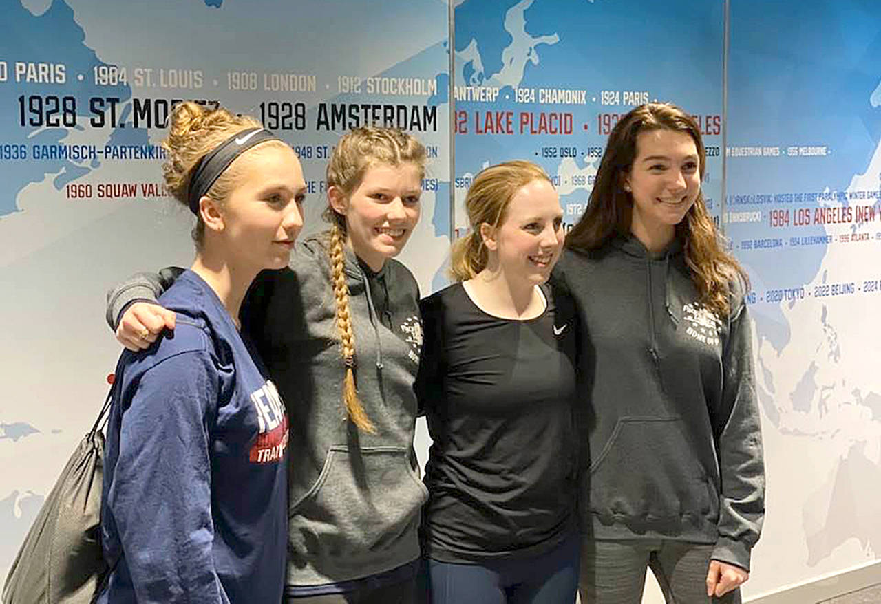 Port Angeles’ Cheyenne Maggard, second from left, and some of her Sabertooth Shooting Squad teammates visit with Ginny Thrasher, 2019 Air Rifle U.S. gold medalist and 2016 Rio Olympic gold medalist. From left, Jesse Brown, Maggard, Thrasher and Alexis Kuntze.