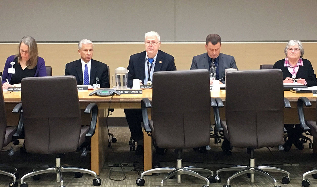 From left, Olympic Medical Center Commissioner Ann Marie Henninger, CEO Eric Lewis, and Commissioners Jim Leskinovitch, John Nutter and Jean Hordyk are shown during a special meeting at the Port Angeles hospital Monday. Leskinovitch, a longtime OMC commissioner, was selected as chair of the board. (Rob Ollikainen/Peninsula Daily News)