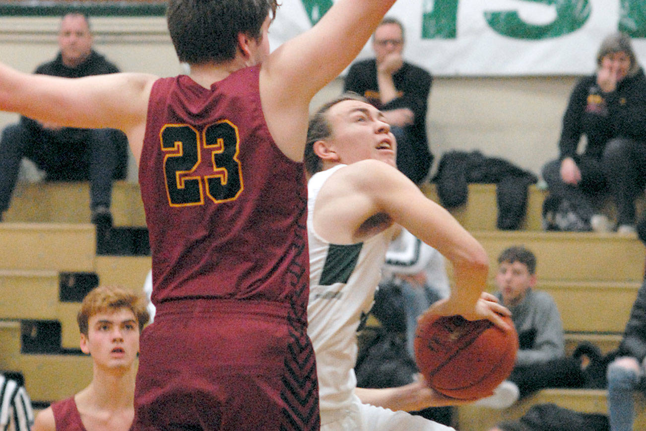 BOYS BASKETBALL: Port Angeles cruises past Kingston to set up rematch with North Kitsap