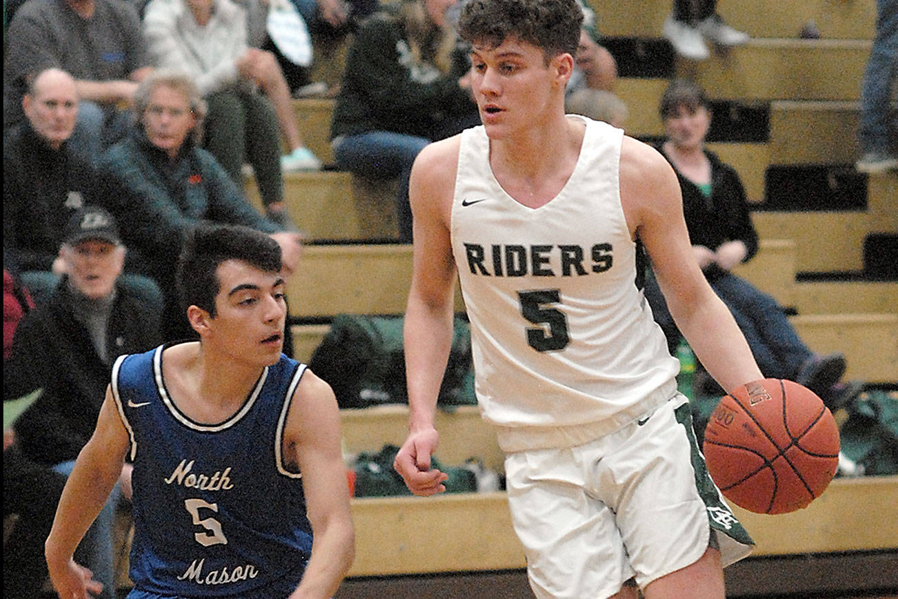 BOYS BASKETBALL: Riders’ defense kennels Bulldogs