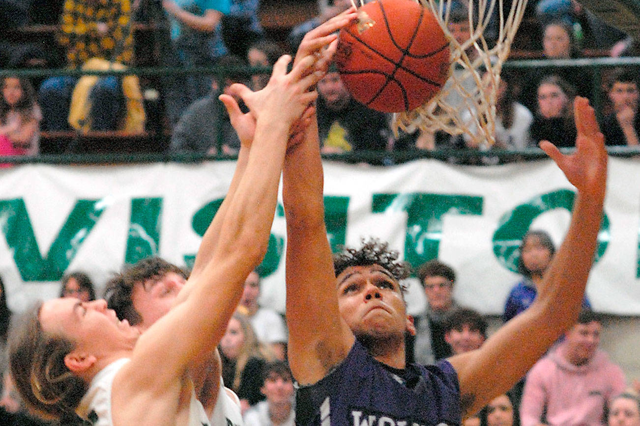 BOYS BASKETBALL: Port Angeles dispatches gritty Sequim in rivalry contest