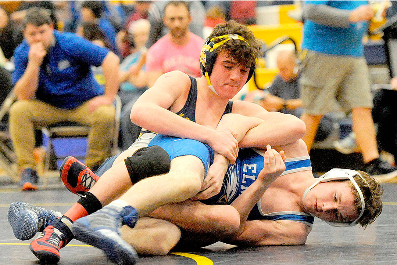 PREP WRESTLING: Port Angeles, Port Townsend, Forks combine for 9 subregional champs