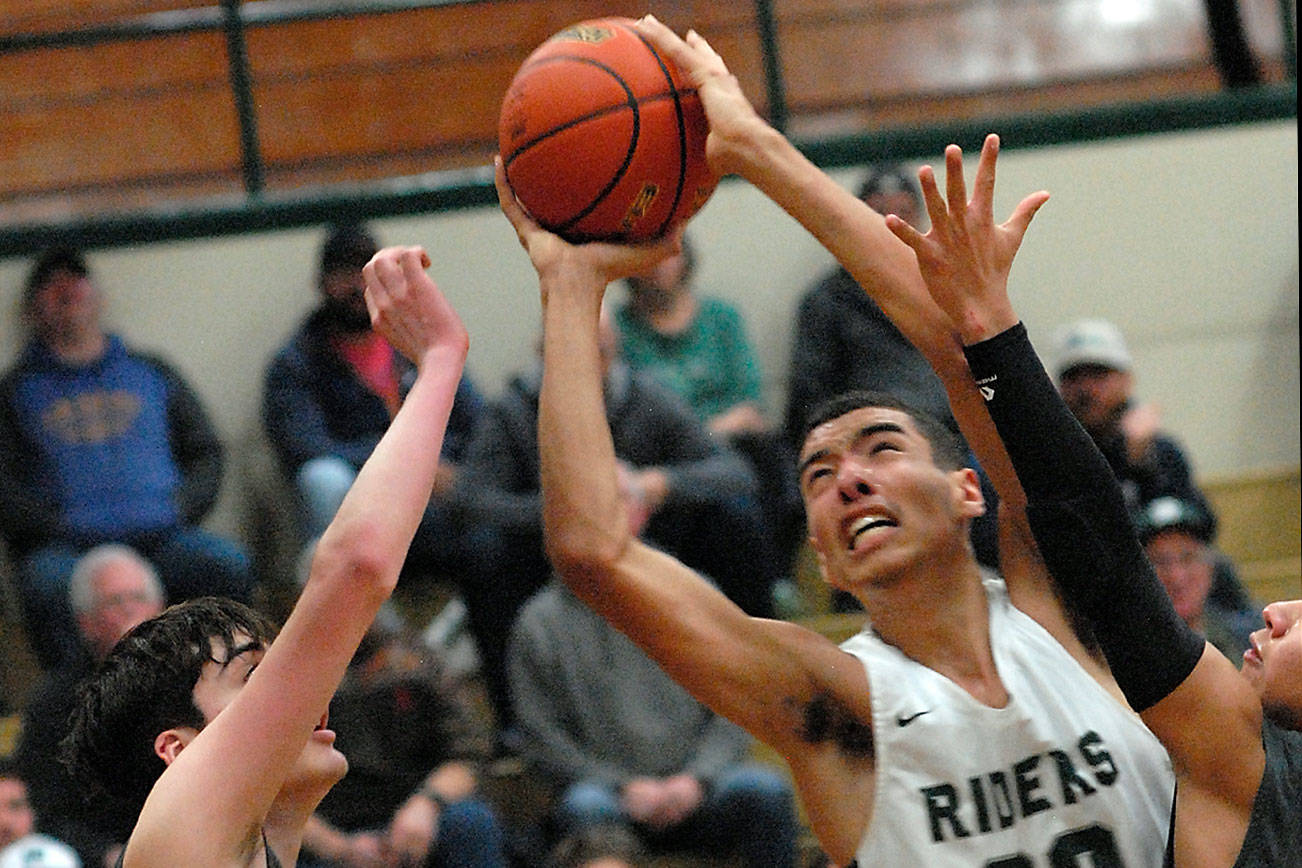 DISTRICT BASKETBALL: Depth, physicality and clutch free-throw shooting late lift Port Angeles boys past Fife