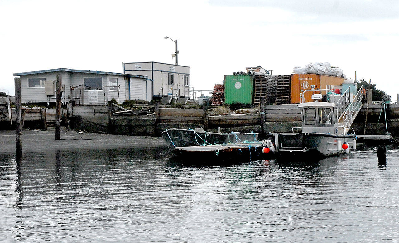 A pair of boats sit at the Cooke Aquaculture dock on Ediz Hook in Port Angeles on Tuesday, March 3, 2020. (Keith Thorpe/Peninsula Daily News)