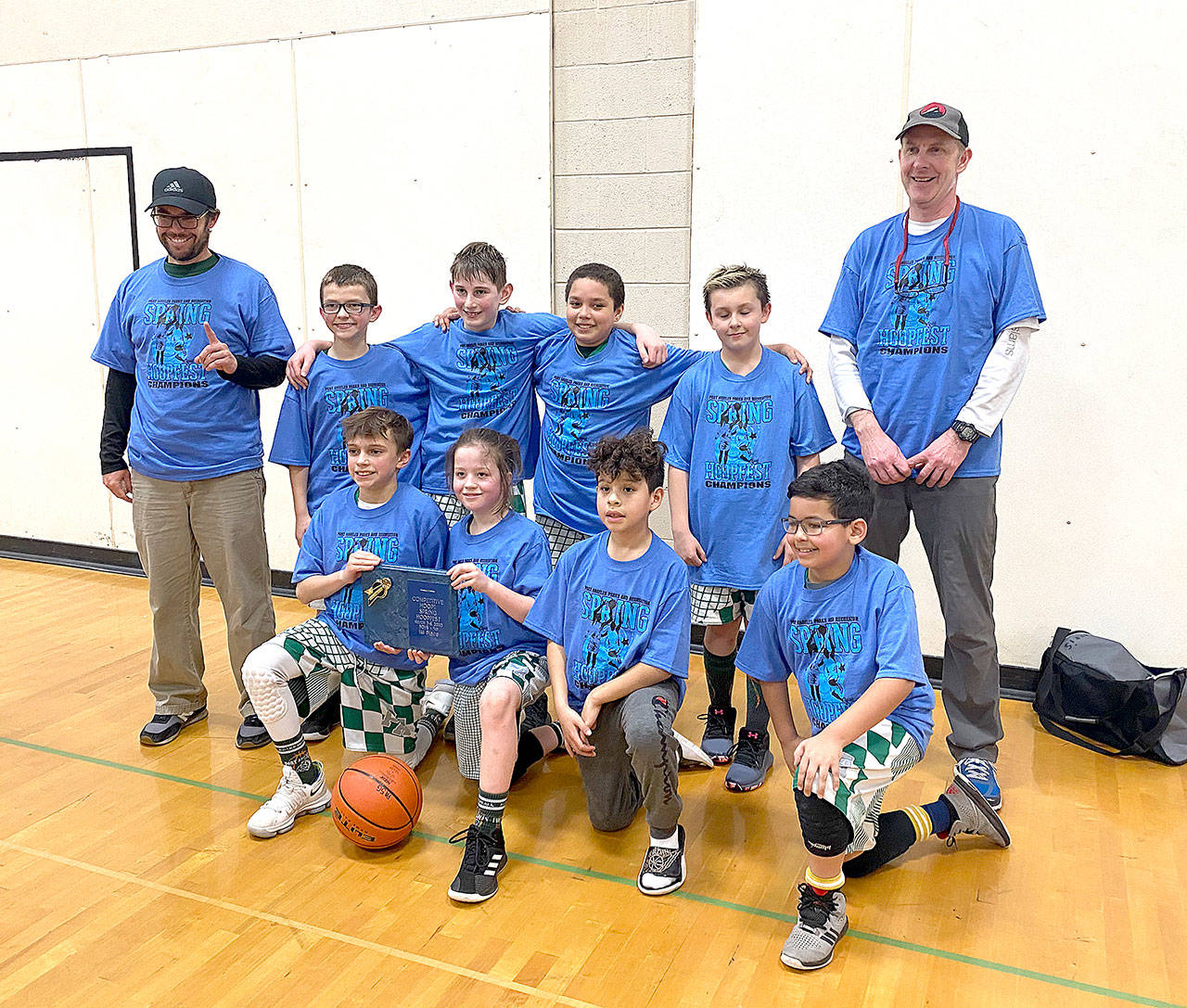 The Port Angeles boys fifth-grade basketball team won the Spring Hoopfest Championship in Port Angeles this weekend by beating Ferndale 38-11 in the championship game. From left, front row are Alik Ross, Kanyon Anderson, Justice Wells and Isaiah Harris. From left, back row are assistant coach Kanyon Anderson, Ashton Gedelman, Abraham Brenkman, Hudson Payne, Conner Clark and head coach Sam Brenkman.