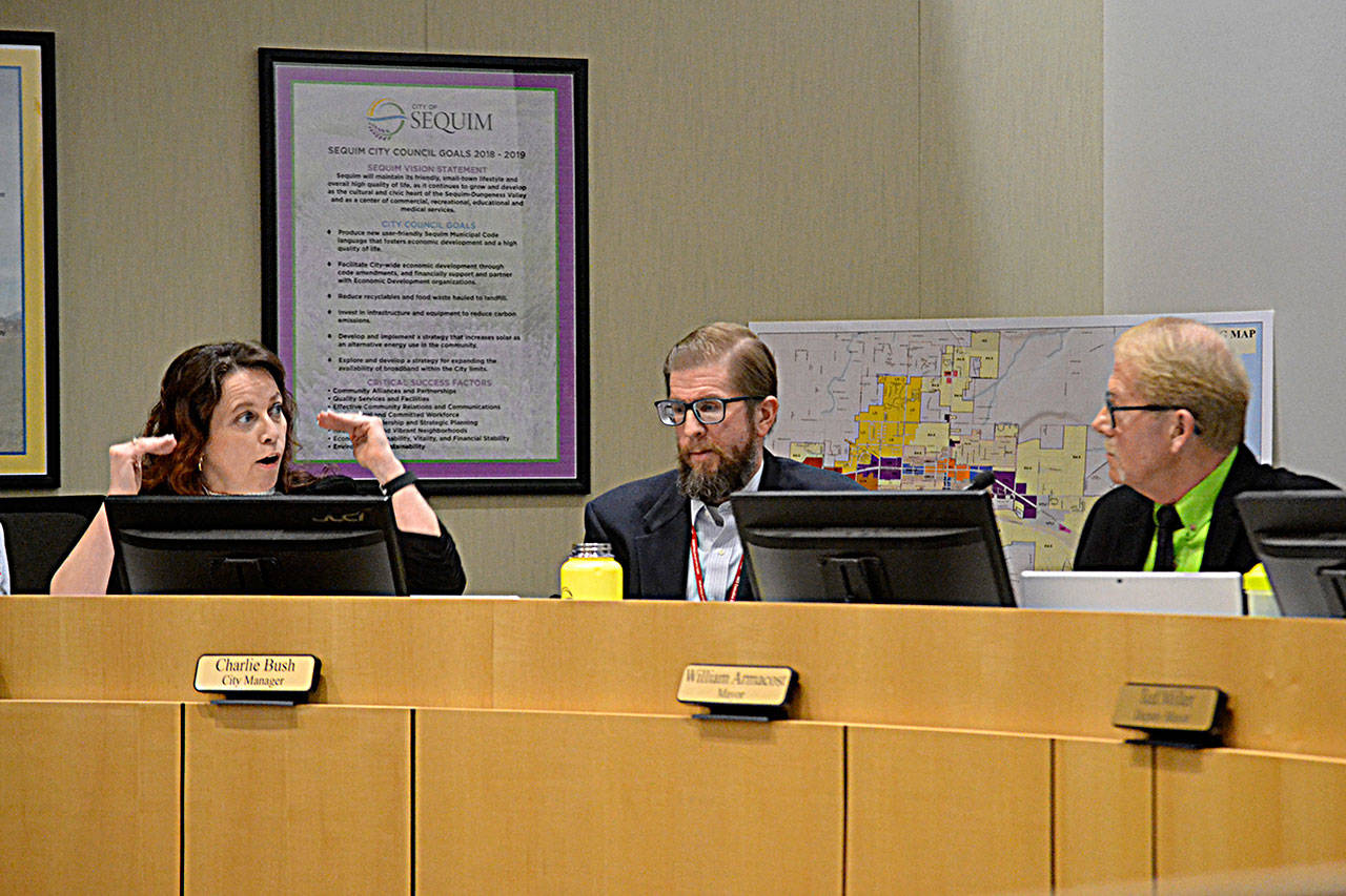 Sequim City Attorney Kristina Nelson-Gross tells City Manager Charlie Bush, Mayor William Armacost and other council members that because of appeals of the permit process for the proposed medication-assisted treatment (MAT) facility, the city must hire a hearing examiner. (Matthew Nash /Olympic Peninsula News Group)