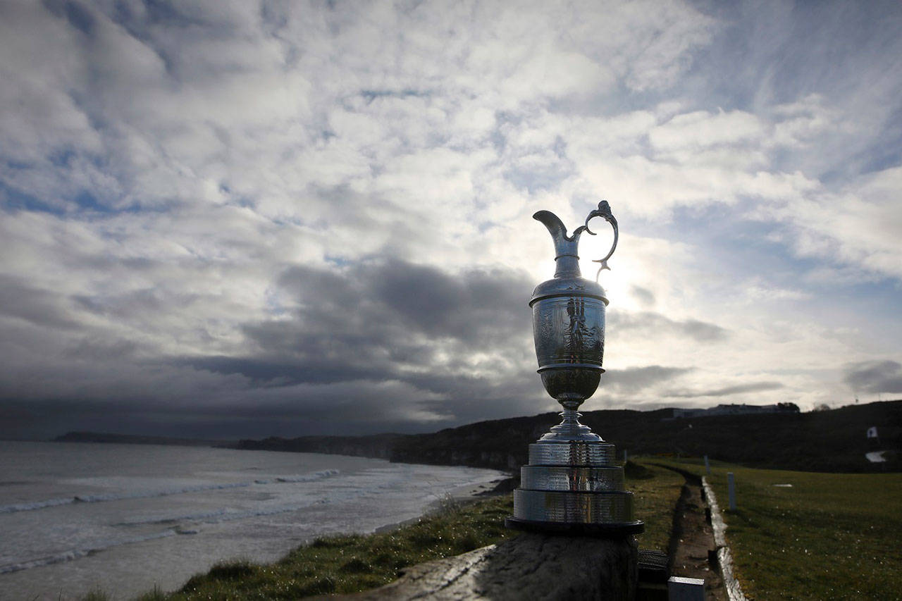 In this April 2, 2019, file photo, the Claret Jug is placed on display to the media at Royal Portrush, Dunluce course, Northern Ireland. The organizers of the British Open announced Monday April 6, 2020, that they have decided to cancel the event in 2020 due to the current Covid-19 pandemic and that the Championship will next be played at Royal St George’s in 2021. (Peter Morrison/Associated Press file)