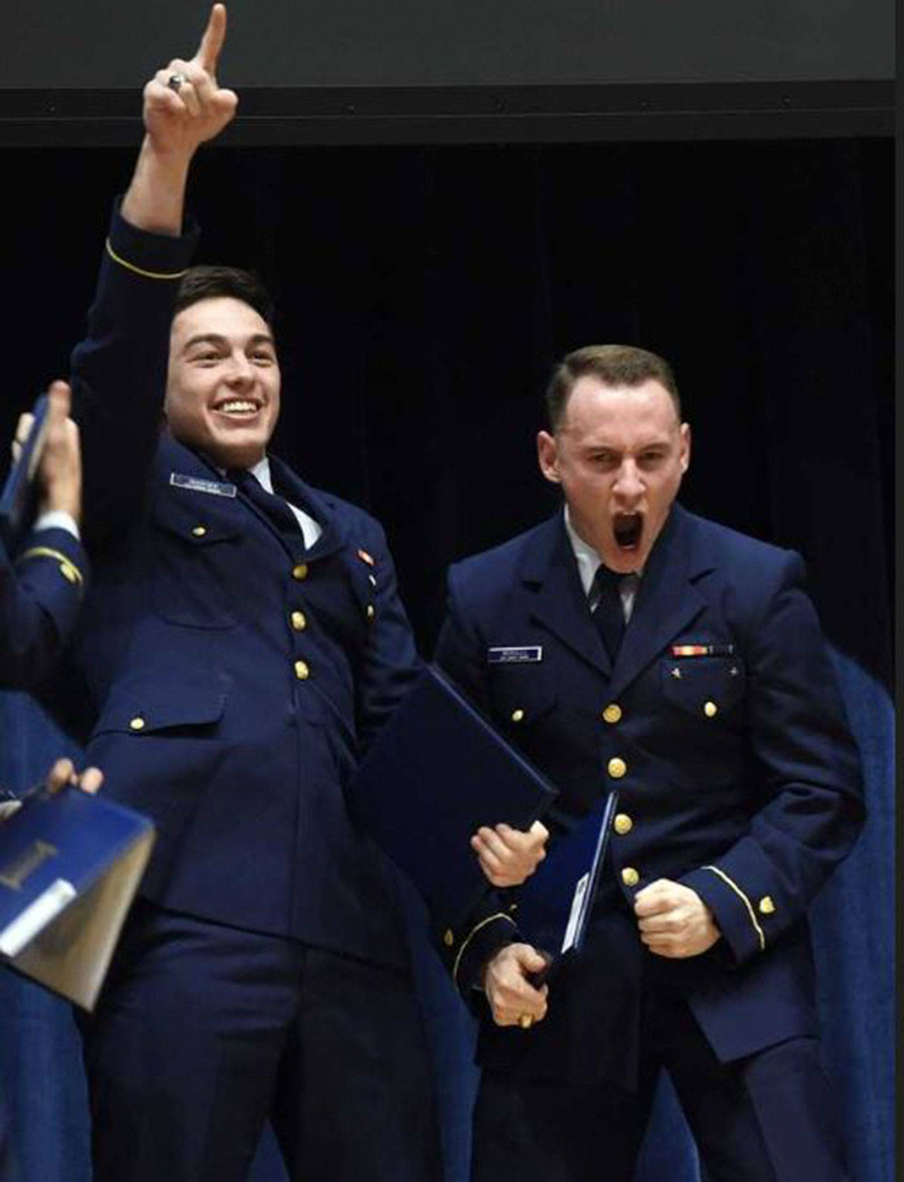 Sequim High graduate Miguel Moroles, right, and fellow U.S. Coast Guard Academy students celebrate their academy flight school nomination. (Submitted photo)