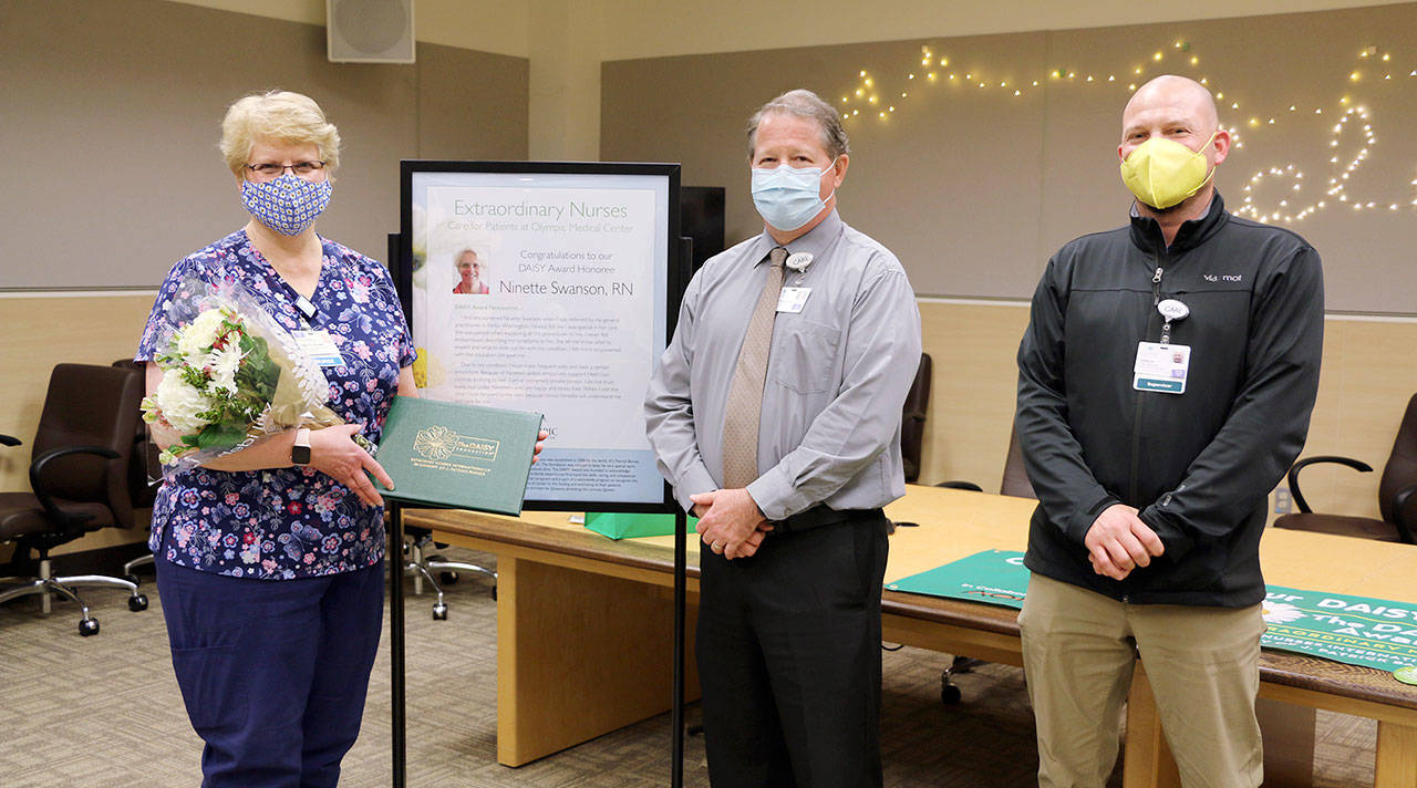 From left to right, Ninette Swanson; Ralph Parker, chief nursing officer; and Josh Lewis, Olympic Medical Physicians Specialty Clinic supervisor. (Submitted photo)