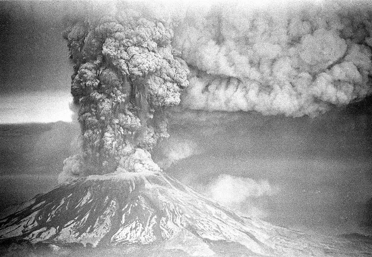 On May 18, 1980, Mount St. Helens sent a plume of ash, smoke and debris skyward as it erupted. Today is the 40th anniversary of the eruption that killed more than 50 people and blasted more than 1,300 feet off the mountain’s peak. (Jack Smith/Associated Press file)