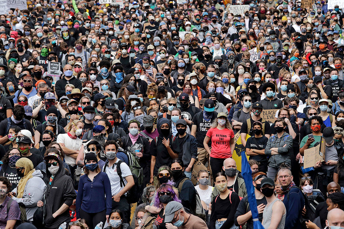 Huge crowd protests in Seattle as criticism of police mounts