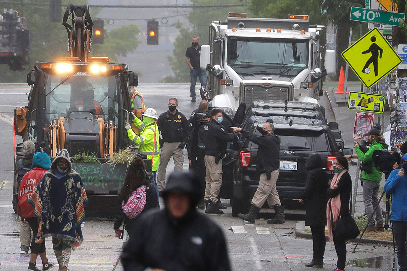 City removes some barriers from Seattle protest zone