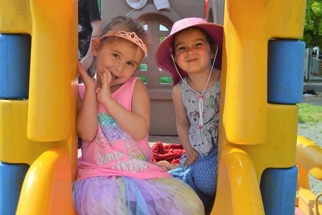 Paisley Allen, left, and Stella Good, both 4, enjoy some playtime at Sequim’s Little Explorers Early Learning Center. (Matthew Nash/Olympic Peninsula News Group)