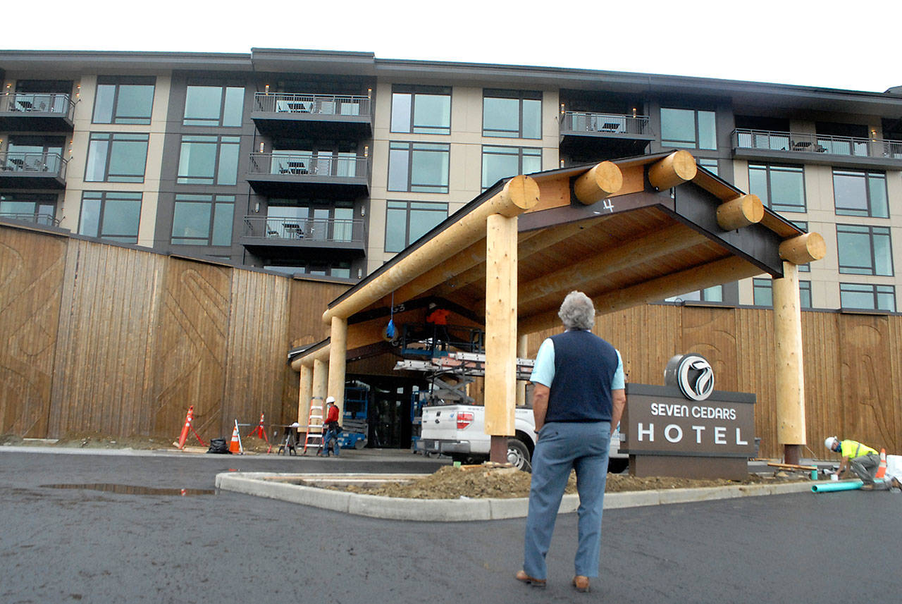 Jerry Allen, chief executive officer of 7 Cedars Casino and Hotel, looks up at the outside of the resort’s main entrance Tuesday, July 7, 2020, as the building nears completion. (Keith Thorpe/Peninsula Daily News)