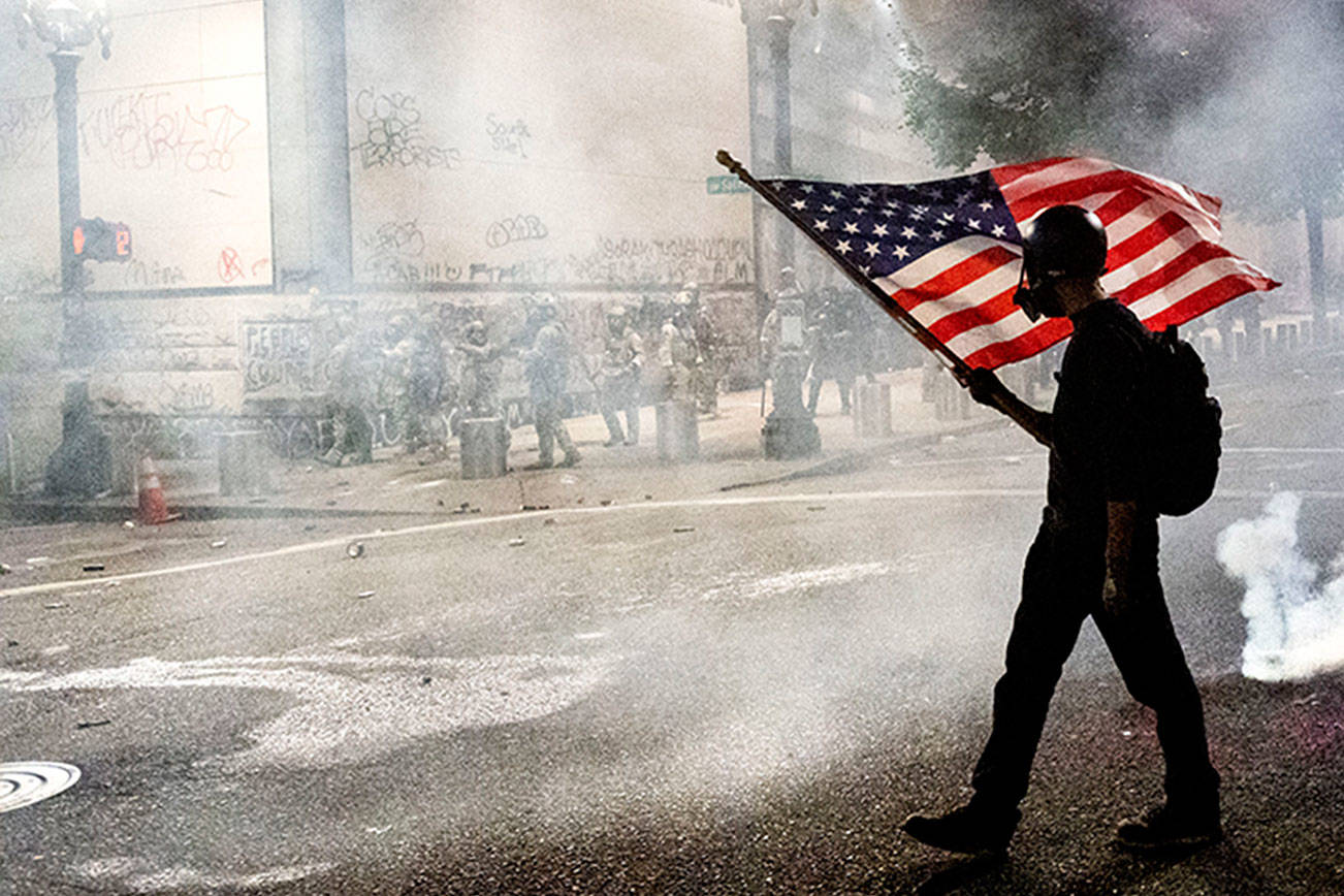 Facing federal agents, Portland protests find new momentum