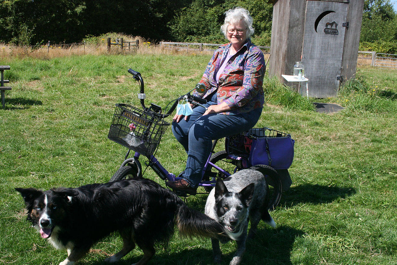 Joyce’s Epona Horse Camp owner Margaret Salstom toddles around her property with an electric bike she calls Nellie.                                 Joyce’s Epona Horse Camp owner Margaret Salstom toddles around her property with an electric bike she calls Nellie.