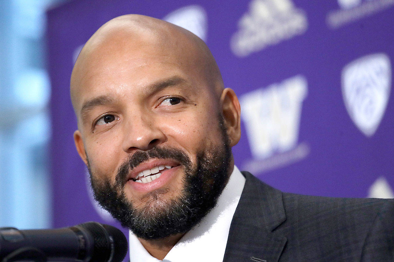 Washington Huskies defensive coordinator Jimmy Lake speaks during a news conference about taking over the head coaching position for the Huskies in Seaattle in December 2019. (Elaine Thompson/The Associated Press)