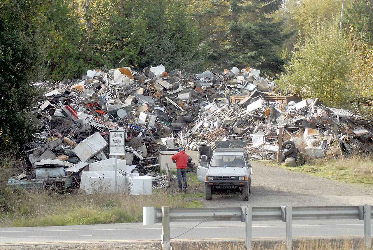 Midway Metals, 258010 U.S. Highway 101 east of Port Angeles is under scrutiny for being in violation of county solid waste standards. (Keith Thorpe/Peninsula Daily News)