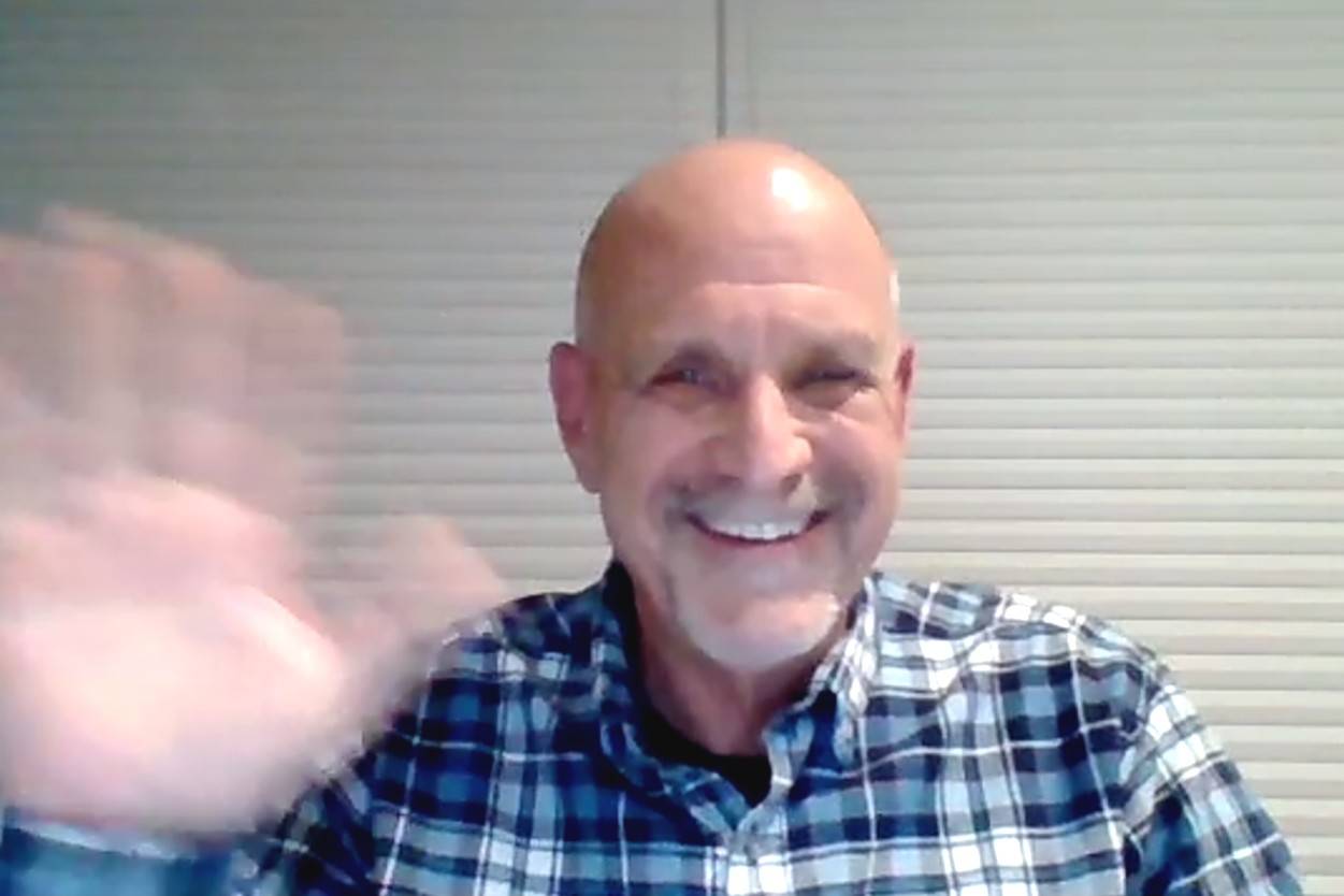 Keith Larkin waves in a screenshot photo to participants of the Sequim city council’s Oct. 26, 2020, meeting after he was appointed and sworn in.