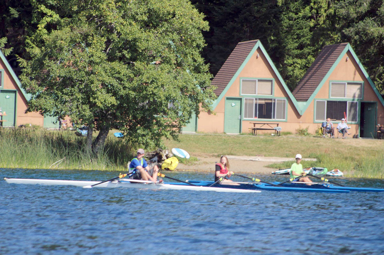 Olympic Peninsula Rowing Association members trained on Lake Crescent this summer while the association’s boathouse was relocated on Ediz Hook. (Courtesy photo)