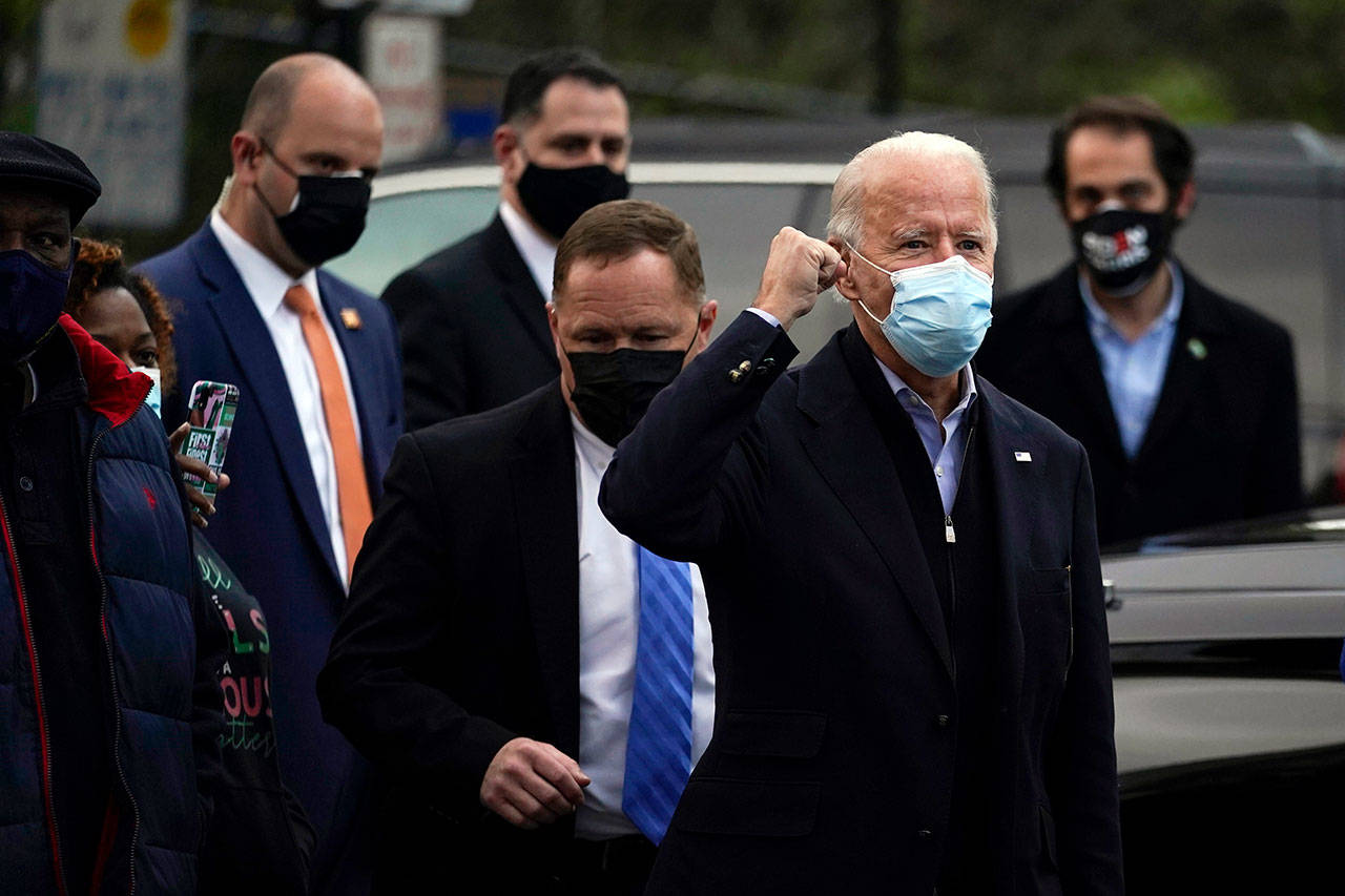 Democratic presidential candidate former Vice President Joe Biden visits with residents across the street from the Joseph R. Biden Jr. Aquatic Center in Wilmington, Del., on Tuesday, Nov. 3, 2020. (Carolyn Kaster/Associated Press)