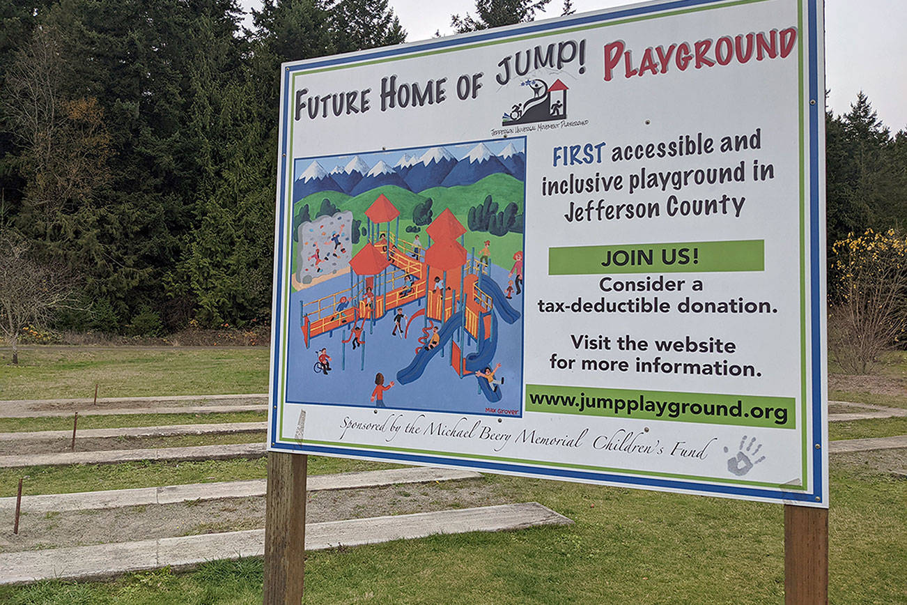 HJ Carroll Park currently displays a large sign with the plans for the Jefferson Universal Movement Playground to be built next to the basketball courts to better serve all members of the community. (Zach Jablonski/Peninsula Daily News)