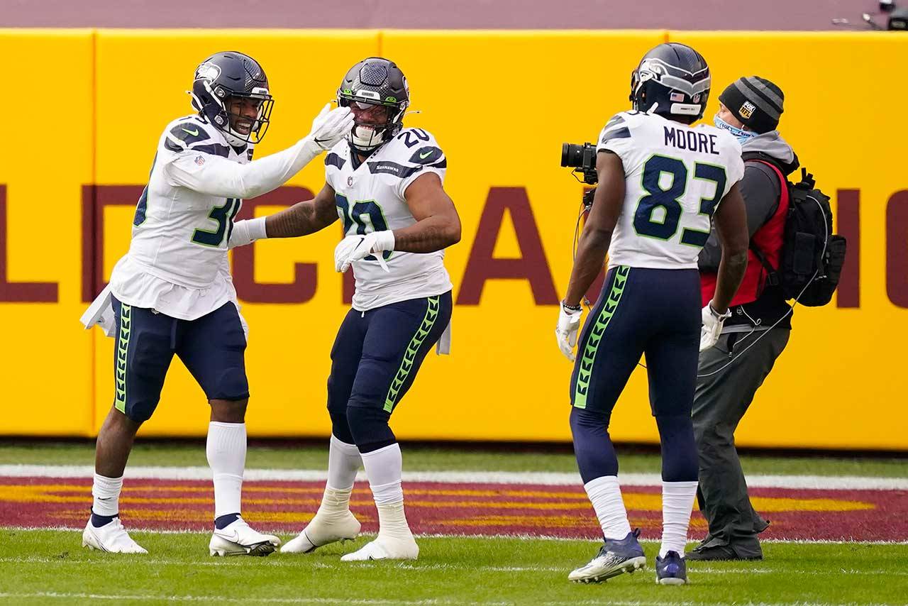 Seattle Seahawks running back Marshawn Lynch celebrates touchdowns with  Skittles – New York Daily News