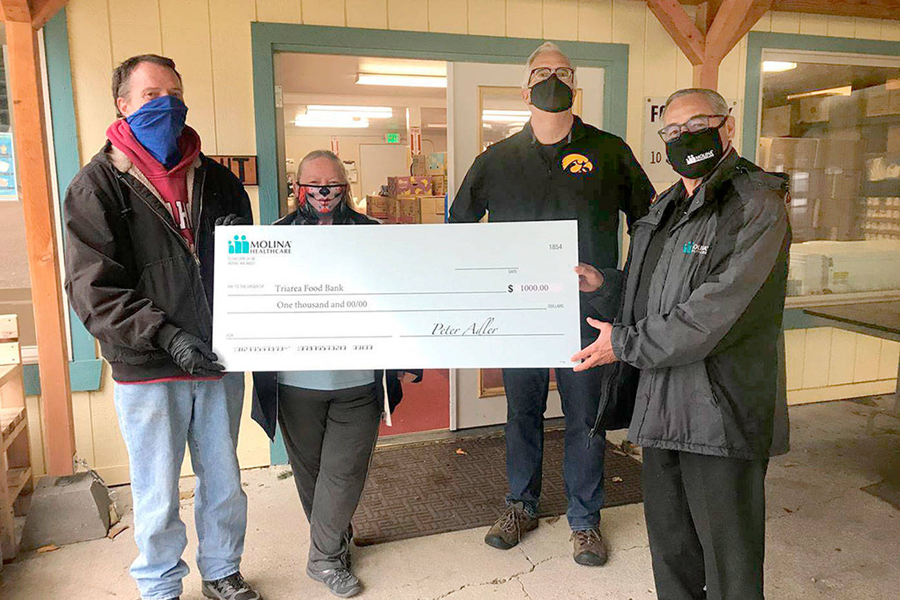 Molina Healthcare of Washington recently presented a $1,000 donation to the Tri-Area Food Bank in Port Hadlock. Pictured, from left to right, John Laird, Sue Bird, Mike Brock and Carlos Mejia Rodriguez

Photo Credit: Molina Healthcare