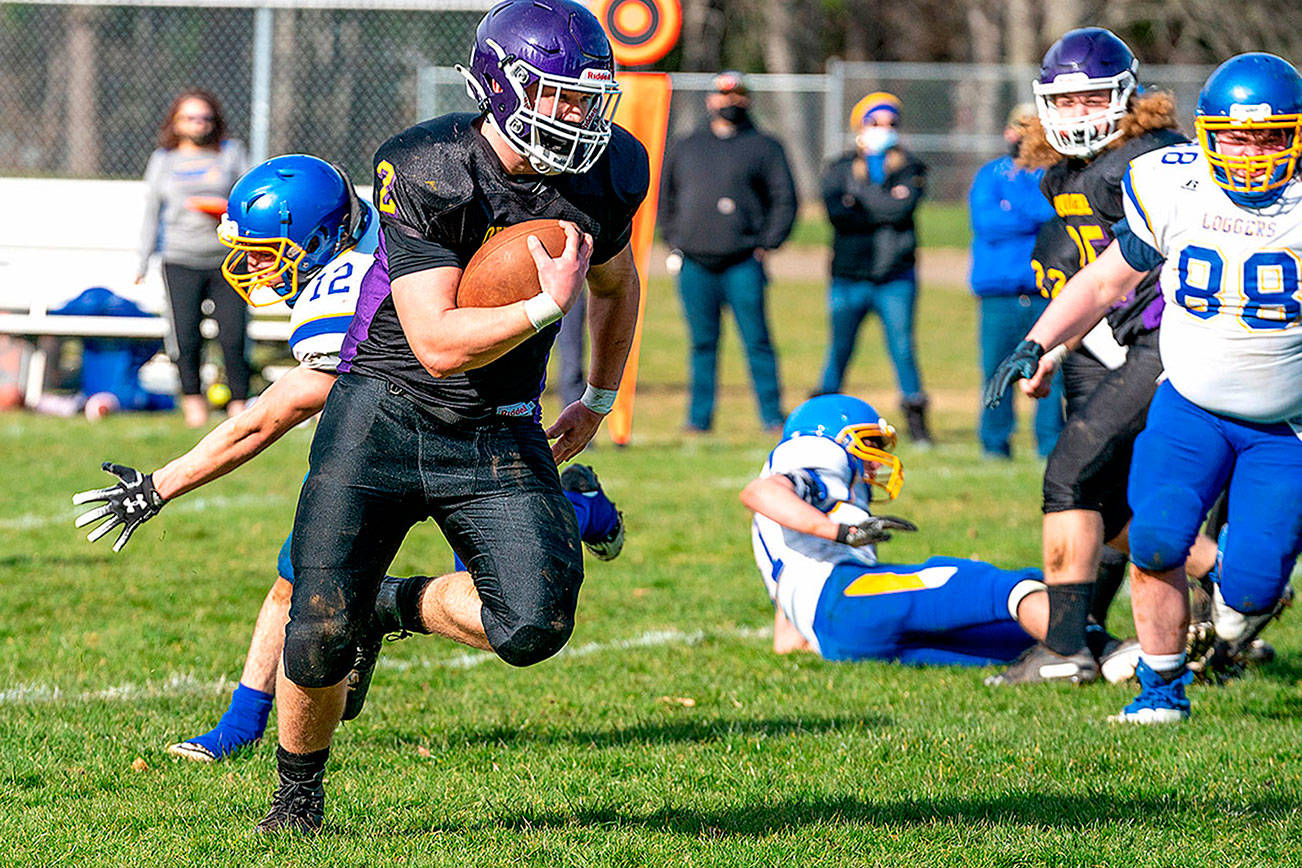 Steve Mullensky/for Peninsula Daily News.                

Quilcene's Bishop Budnek Scampers for a 60-yard touchdown run during a Saturday home game against the Crescent Loggers. In on the play are Crescent's Wyatt Lee (12) and Darren Lee (88).