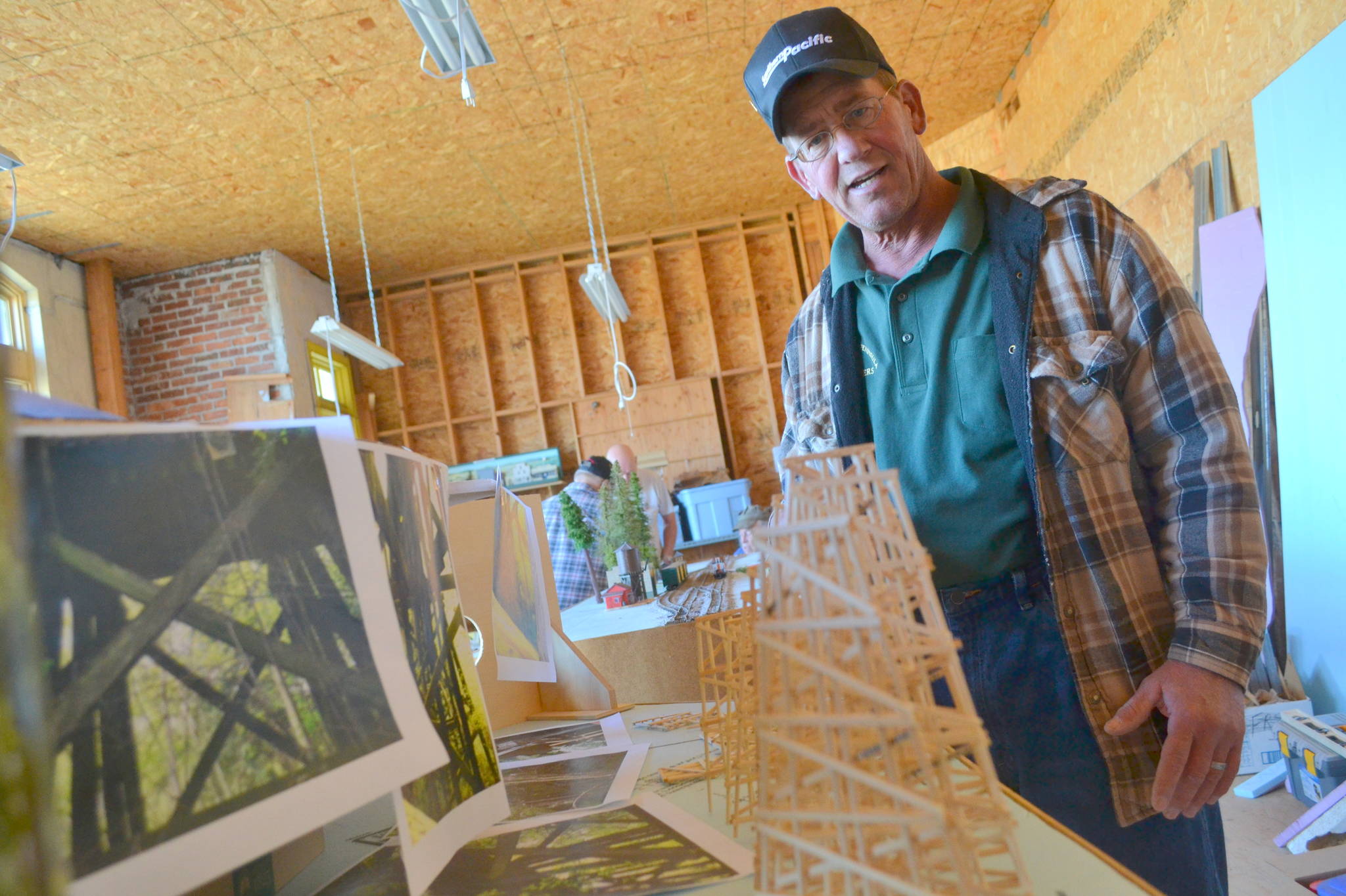 John Kumparak, the North Olympic Peninsula Railroaders’ vice president, seen in 2016, said he’s “learned a lot about the history of the area through the club,” including through work on re-creating a model railroad that ran across the Peninsula. Club members seek new space for the railroad as board members from the North Olympic History Center consider future plans for the Lincoln School, where it’s been housed for years. (Matthew Nash/Olympic Peninsula News Group)